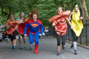 Lauren Kim (far right) and Jillian (second from right) Scharello get into the spirit of burning calories while eating during the recent NYC Pizza Run.