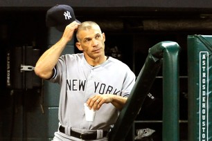 Joe Girardi in the Yankees dugout during the Astros game