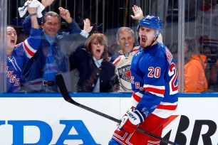 Chris Kreider celebrates after netting a game-tying goal in the third period of Game 3 against Montreal.