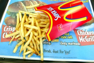 McDonald's will begin offering seasoned french fries in California and St. Louis.