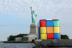 JERSEY CITY, NJ - JULY 11: A general view of a Giant Rubik's Cube Floats Down Hudson River To Celebrate Birthday Of Erno Rubik And The Beyond Rubik's Cube Exhibition At Liberty Science Center on July 11, 2014 in Jersey City City. (Photo by Bennett Raglin/Getty Images for Liberty Science Center)