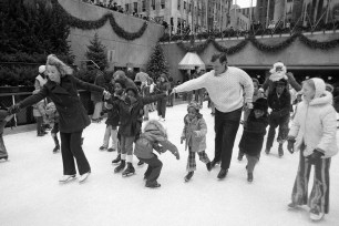 Ethel Kennedy, left, widow of the late Sen. Robert F. Kennedy, and Sen. Edward M. Kennedy, brother of Robert, skate with a young girl at New York's Rockefeller center skating rink, on Dec. 18, 1971.