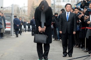 Cho Hyun-ah, also known as Heather Cho, daughter of the chairman of Korean Air Lines, Cho Yang-ho, bows in front of the media in Seoul on Dec. 12.