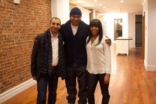 LL Cool J, center, with his daughter Italia Smith and developer Pete Jacov at an open house in West Harlem.