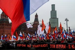 People march in memory of Boris Nemtsov in central Moscow.