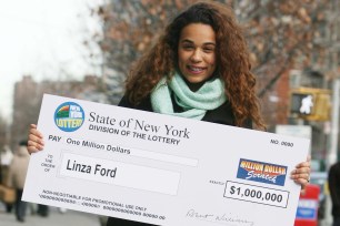 Linza Ford with her $1 million lottery winnings in 2012.