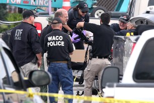 Wace Police recover a weapon from a vehicle in the Twin Peaks parking lot following the deadly weekend shootout.