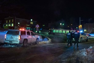 Police at the scene of a shooting at the Quebec City Islamic Cultural Center.