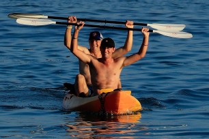 HONOLULU, HI - JANUARY 12:  Smylie Kaufman of the United States and Jordan Spieth of the United States kayak after playing in the first round of the Sony Open In Hawaii at Waialae Country Club on January 12, 2017 in Honolulu, Hawaii.  (Photo by Cliff Hawkins/Getty Images)