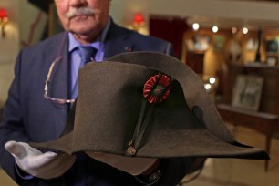 Napoleon expert Jean Claude Dey presents Napoleon's hat, from the Napoleonic collection of the Palais de Monaco, in Fontainebleau.