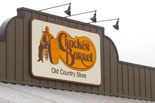 A sign for a Cracker Barrel restaurant