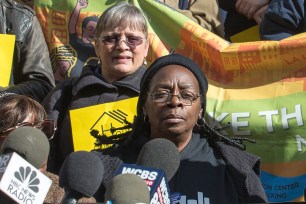 Nathylin Flowers Adesegun joined activists at a rally on City Hall steps demanding Mayor de Blasio end homelessness.