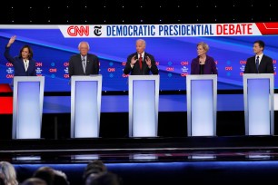 Sen. Kamala Harris, Sen. Bernie Sanders, former Vice President Joe Biden, Sen. Elizabeth Warren and South Bend, Ind., Mayor Pete Buttigieg participate in a Democratic primary debate on Tuesday.