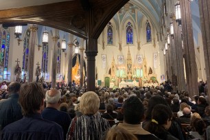 A view of the alter, from a standing room only Sunday mass at St. Stephens Church, in honor of St. Cabrini