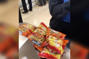 TSA stopped a woman for having 20 bags of Hot Cheetos.