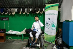 Wisam Sami, a 29 year-old Iraqi refugee, trains wheelchair fencing at Apostolos Nikolaidis stadium in Athens, Greece.