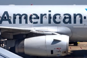 An American Airlines passenger aircraft parked at a gate at Ronald Reagan Washington National Airport in Washington, D.C.