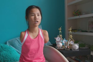 Girl born without arms can still play baseball