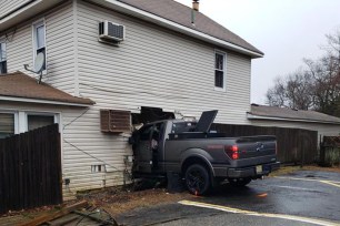 The truck that crashed through Barbara Anne Filan's home.