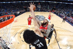 Jarrett Allen looks to block a Brandon Ingram's shot during the Nets' win over the Pelicans.