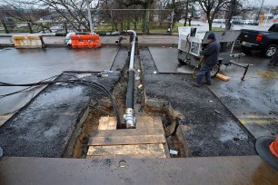 DEP and city crews work to repair a broken sewer line at S. Conduit Ave and 150th St. in Queens.