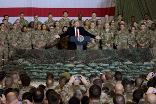 President Trump speaks to the troops during a surprise Thanksgiving day visit at Bagram Air Field in Afghanistan.