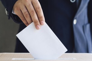 A person voting