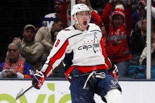 Alex Ovechkin celebrates after scoring the second of his three goals in the Islanders' 6-4 loss to the Capitals on Saturday.