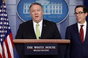 Mike Pompeo (left) Steve Mnuchin brief reporters about additional sanctions placed on Iran.