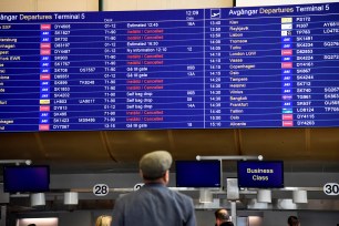 A departures board shows cancelled SAS flights at Stockholm Arlanda airport in Stockholm, Sweden.