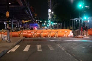 A flood barrier installed on South Street in Manhattan as Tropical Storm Isaias nears