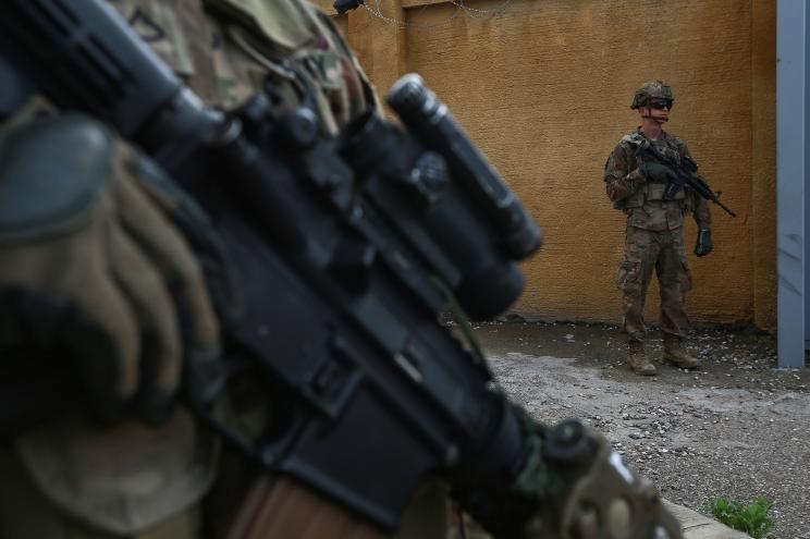 US soldiers stand guard at the K1 Air Base near Kirkuk