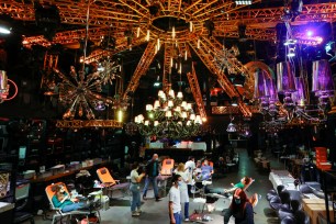 People give blood on the stage of the closed MAD (Moulin a Danse) night club in Lausanne, Switzerland.