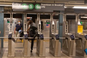 A man hopping over a subway turnstile at the 86th Street in Manhattan on July 6, 2020.