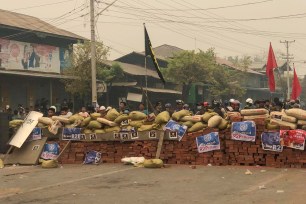 Protesters defend themselves from the troops in Kale, Sagaing region, Myanmar March 28, 2021