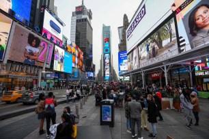 People seen at Times Square on March 25, 2021.