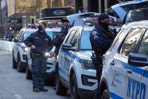 New York Police Department officers arrive outside Trump Tower