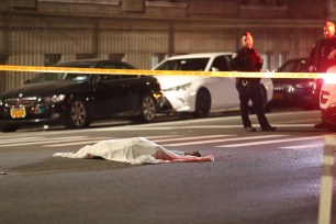 A body is seen in the street of a man who laid down and was then dragged by a car to his death