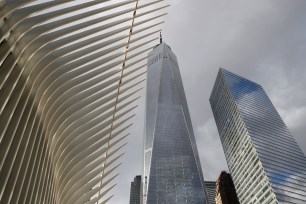 Parts of the Oculus, left, One World Trade Center, center, and 7 World Trade Center are seen