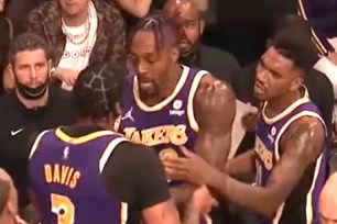 Anthony Davis (left) and Dwight Howard get into an altercation during the Lakers' 115-105 loss to the Suns.