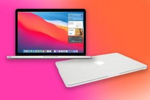 A MacBook Pro and a closed MacBook on a pink and orange background