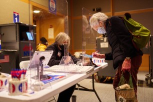 People vote early in the citywide election at the Metropolitan Museum of Art on Saturday, October 23, 2021