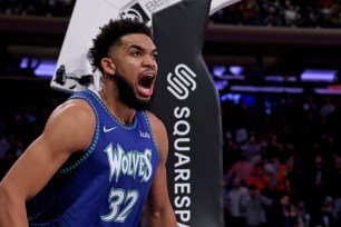 Karl-Anthony Towns celebrates late in the fourth quarter of the Knicks' 112-110 loss to the Timberwolves.