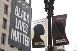 A sign reading 'Black Lives Matter' is seen at Black Lives Matter Plaza