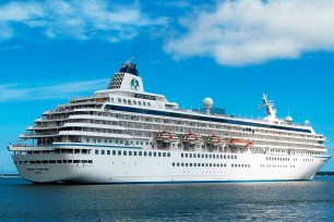 FILE - The cruise liner Crystal Symphony leaves the harbor in Charleston, S.C. on May, 21, 2013. Scheduled to arrive in Miami on Saturday, Jan. 22, 2022, the ship, with hundreds of passengers aboard, was diverted to the Bahamas after a U.S. judge granted an order to seize the vessel as part of a lawsuit over unpaid fuel. (AP Photo/Bruce Smith, File)