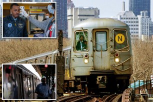 A subway train travels above ground