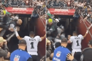 Jalen Hurts is nearly crushed by falling Eagles fans