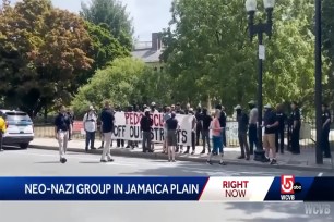 Protestors outside library.