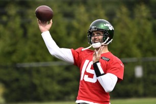 Jets quarterback Joe Flacco (19) throws a pass at practice in Florham Park, NJ.