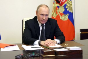 Russian President Vladimir Putin declared martial law in the four annexed regions of Ukraine while chairing a Security Council meeting via a video link at the Novo-Ogaryovo state residence outside Moscow on October 19.